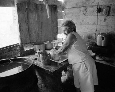 woman-wash-dishes-by-window.jpg