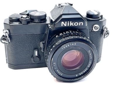 Nikon FM black with 50mm f1.8 Series E Nikon lens.jpeg Nikon FM black with 50mm f1.8 Series E Nikon lens.jpeg