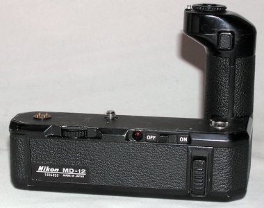 Nikon MD-12 Motor Drive is 99 % identical to the MD-11 but adds a built-in circuit to cut the ...jpg Nikon MD-12 Motor Drive is 99 % identical to the MD-11 but adds a built-in circuit to cut the ...jpg