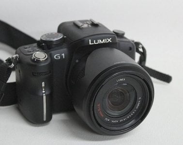 First mirrorless? Trendsetting Panasonic Lumix G1 MFT-format shown with G Vario 14-45mm zoom ...jpeg First mirrorless? Trendsetting Panasonic Lumix G1 MFT-format shown with G Vario 14-45mm zoom ...jpeg