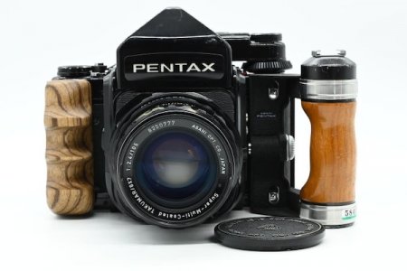 Pentax 67 with TTL meter rism, 105mm f:2.4 Takumar lens, wooden handgrip.jpg