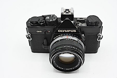 Olympos OM-2n looks giregeous in black, This one sports a 50mm f:1.8 F.Zuiko lens jpg.jpeg