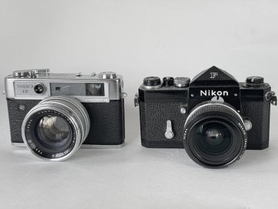 Yashica Lynx-14E and Nikon F with plain oprism and 28mm f-2.8 Nikkor.jpg