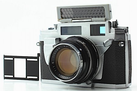 Konica IIIM with hinged selenium meter in the up (operating) position. Note mertering needle m...jpg Konica IIIM with hinged selenium meter in the up (operating) position. Note mertering needle m...jpg
